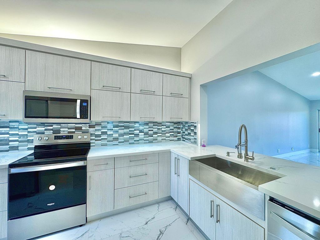 Photo of 340 NW 67th Street #208, Boca Raton, FL 33487 (MLS # R11102074)