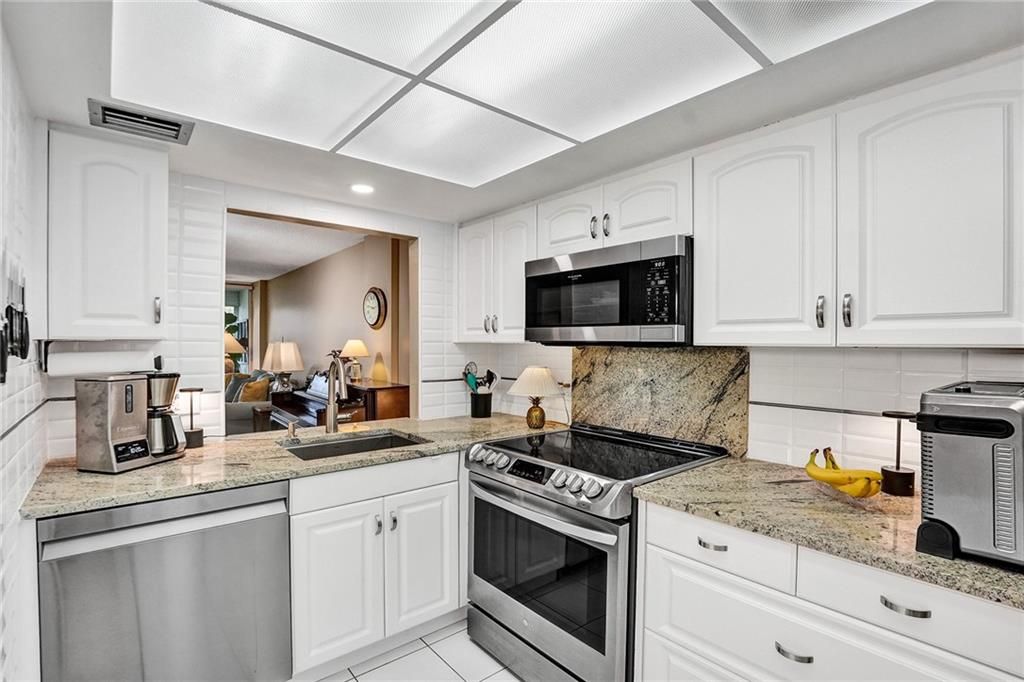 Photo of 121 Royal Park Dr #1-C, Oakland Park, FL 33309 (MLS # F10377815)