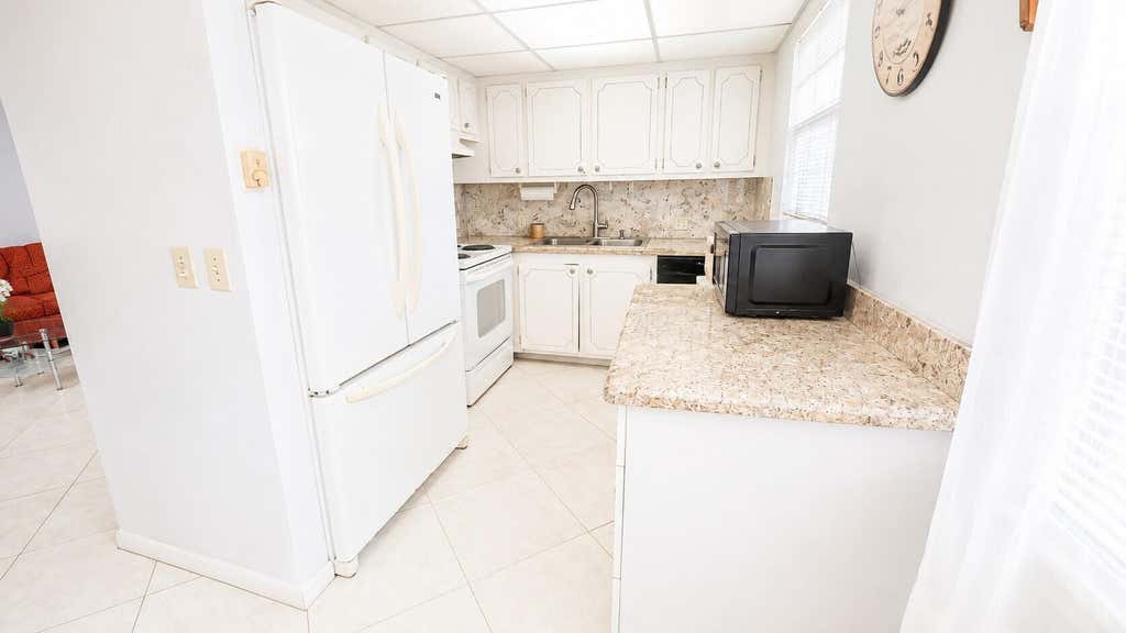 Photo of 5 SUFFOLK A, Boca Raton, FL 33434 (MLS # B26059430)