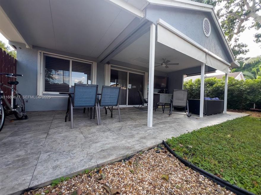 This stunning, move-in-ready single-family home features 3 generously sized bedrooms, 2 bathrooms, and a 2-car garage with additional driveway space for up to 3 more vehicles. Located in a secure gated community, the home has had its roof, windows, and A/C system replaced in 2014. With a low HOA fee of just $278.22 per month--including internet and cable--you'll enjoy resort-style amenities such as a clubhouse with a large and a small pool, tennis, pickleball, and basketball courts, a gym, a tot lot, and both indoor and outdoor jacuzzis and saunas. Relax on your private patio, and benefit from the convenience of an on-site Montessori School!. Sellers are willing to negotiate, don't miss this opportunity