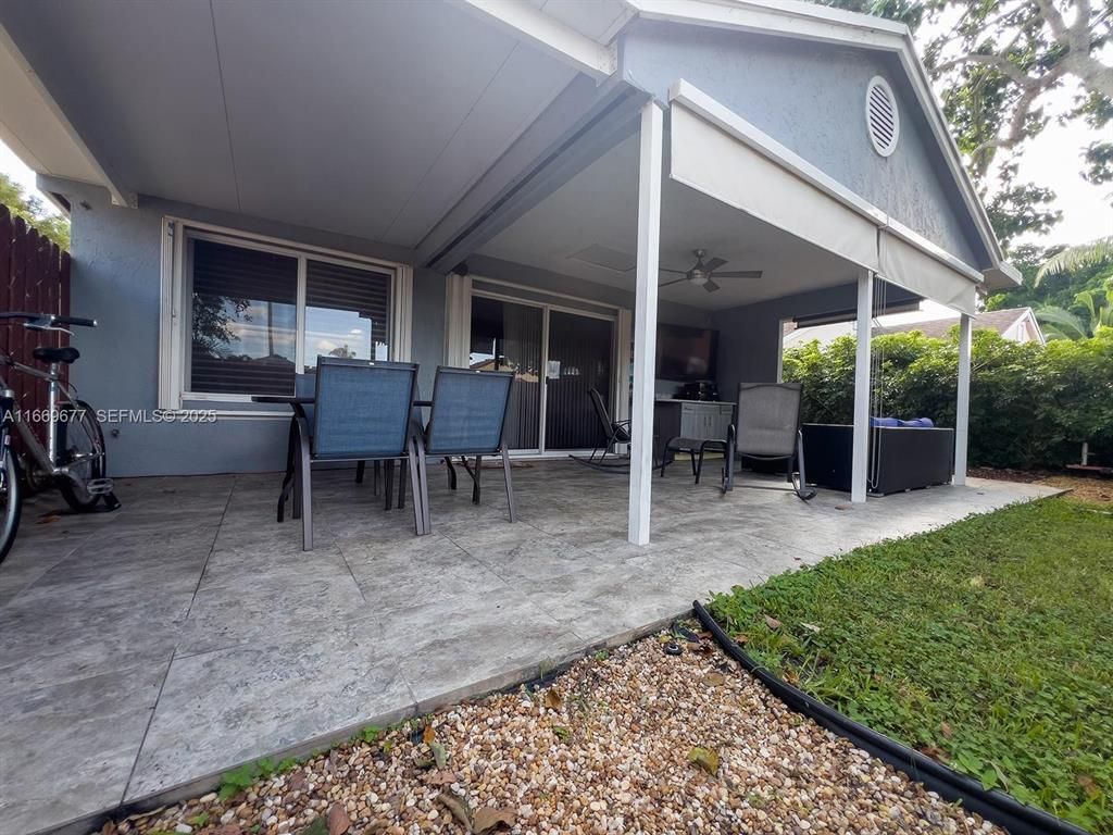 Photo of 2051 NW 35th Terrace, Coconut Creek, FL 33066 (MLS # B26004712)