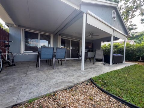 Photo of 2051 NW 35th Terrace, Coconut Creek, FL 33066 (MLS # B26004712)