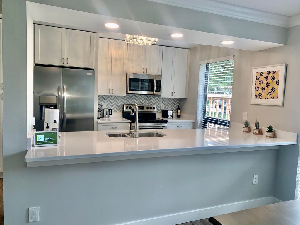 Photo of 138 Brackenwood Road, Palm Beach Gardens, FL 33418 (MLS # R10790411)