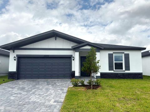 Photo of 15975 SW Vine Drive, Indiantown, FL 34956 (MLS # B26028212)