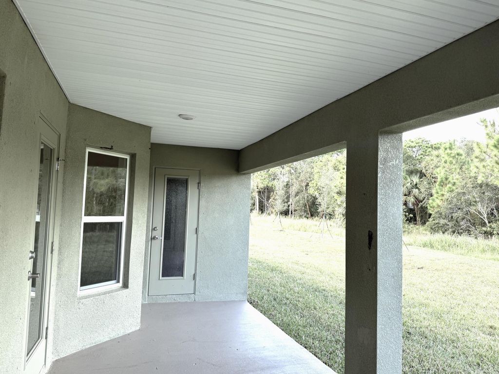 Photo of 8740 Waterstone Boulevard, Fort Pierce, FL 34951 (MLS # R10958006)