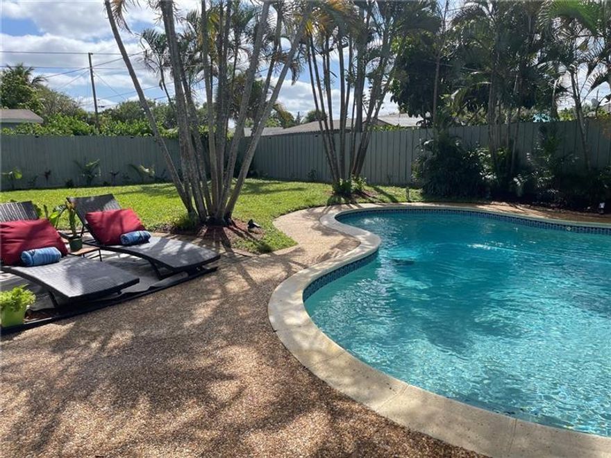 Welcome to your new paradise. Beautiful, Fully furnished, 2/2 located in Riverland, just near the boat drop & not far from the sand. This gem features a crystal clear sparkling pool, large privately fenced yard, charcoal BBQ, sprinkler system, hurricane impact windows & washer/dryer on premise. Sit back & relax after a long day in the sun on white leather, electric recliners, watching your favorite show on a 70" LG TV. But don't worry, there is a tv for everyone featuring 3 other 65" LG TVs in other rooms, 3 queen beds, meditation fountain.... all you really need is your toothbrush!