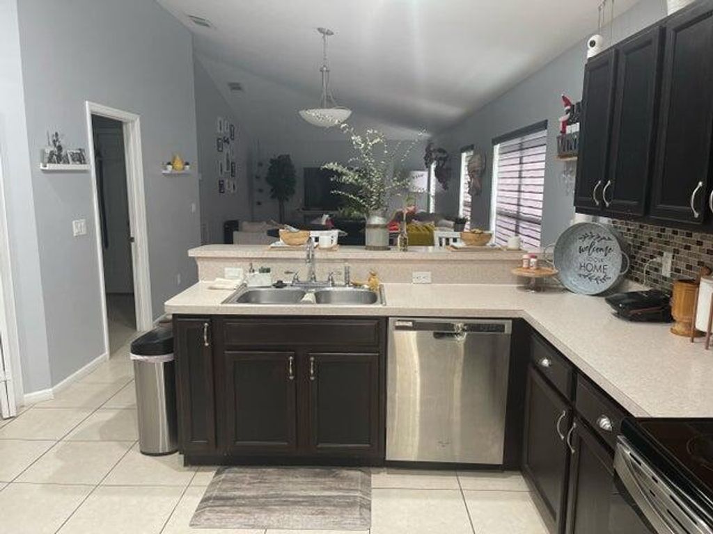 Photo of 6222 NW Gisela Street, Port Saint Lucie, FL 34986 (MLS # R10965385)