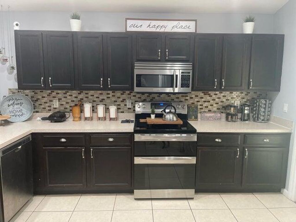 Photo of 6222 NW Gisela Street, Port Saint Lucie, FL 34986 (MLS # R10965385)