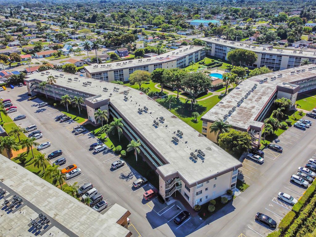 Photo of 700 Village Green Court #221, Palm Springs, FL 33461 (MLS # R11098480)