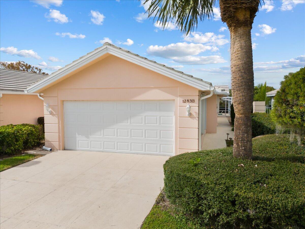 Beautiful 2Bd, 2Ba waterfront POOL villa. Ideally located in the heart of St Lucie West. This home offers optimal tranquility, relaxation and comfort inside and out. Enjoy the newly rescreened lanai with private pool and gorgeous lake views. Retreat indoors to an inviting and spacious living area. Central kitchen is updated with newer stainless steel appliances and granite countertops. Casual dining and living room overlooks the beautiful outdoor space. Split bedroom suites, each with large walk-in closets w/built-in shelving. Master bathroom is completely remodeled with beautiful tile work. A large interior laundry room with wash tub and lots of extra storage. Accordion shutters throughout! Freshly painted exterior 2024. Refrig 2025, AC 2022. Tankless WH 2024. Roof 2012. Must See!