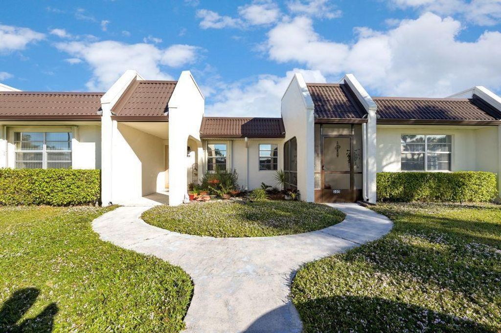 Photo of 105 Lake Rebecca Drive, West Palm Beach, FL 33411 (MLS # R10683050)