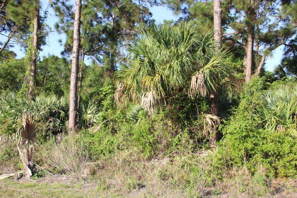 Photo of 3272 SW Port St Lucie Boulevard, Port Saint Lucie, FL 34953 (MLS # R10953991)