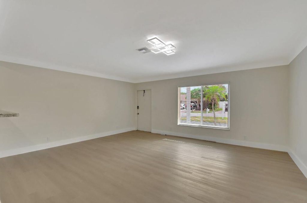 Photo of 1313 NW 7th Street, Boca Raton, FL 33486 (MLS # R11048483)