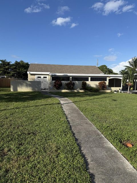 Photo of 373 Glenn Road, West Palm Beach, FL 33405 (MLS # R11136268) Photo of 373 Glenn Road, West Palm Beach, FL 33405 (MLS # R11136268)