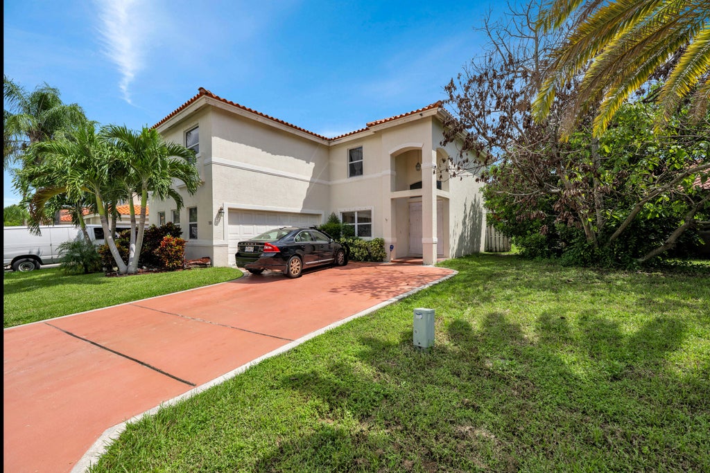 Photo of 7308 N NAUTICA Way, Lake Worth, FL 33467 (MLS # B26079424)