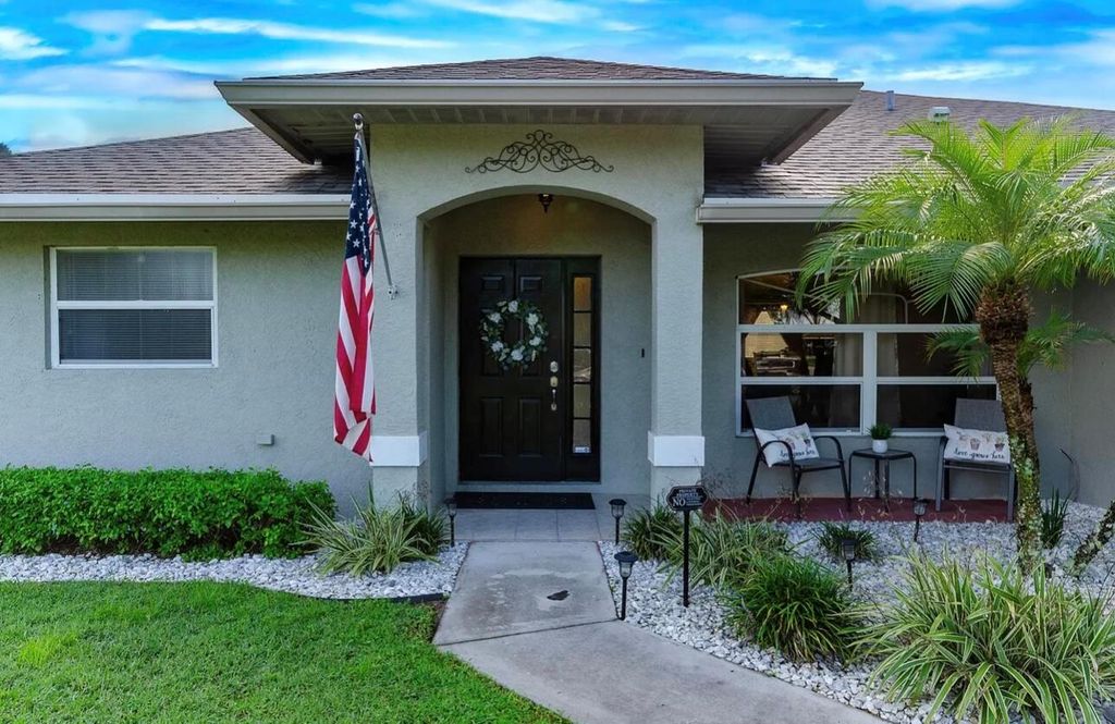 Photo of 4557 SW Athena Drive, Port Saint Lucie, FL 34953 (MLS # R11084619)