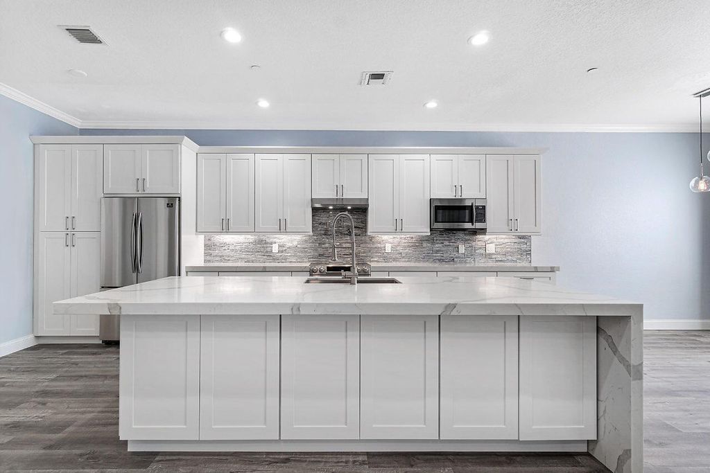 Photo of 65 Lancaster Road, Boynton Beach, FL 33426 (MLS # R10891752)