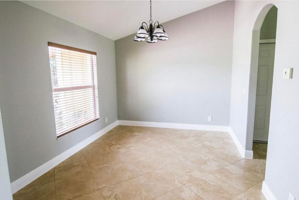 Photo of 558 SW Colleen Avenue, Port Saint Lucie, FL 34983 (MLS # R11152370)