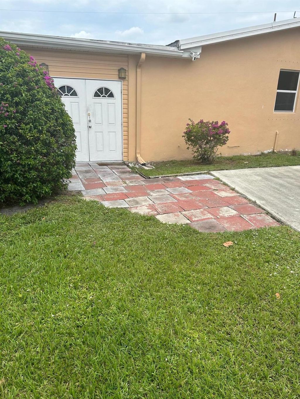 Photo of 774 E Prima Vista Boulevard, Port St Lucie, FL 34952 (MLS # R10898135)