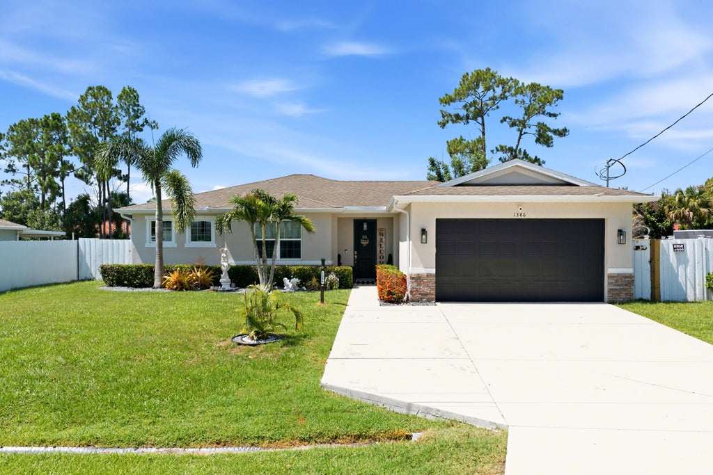 Photo of 1386 SW Babcock Avenue, Port Saint Lucie, FL 34953 (MLS # B26052953)