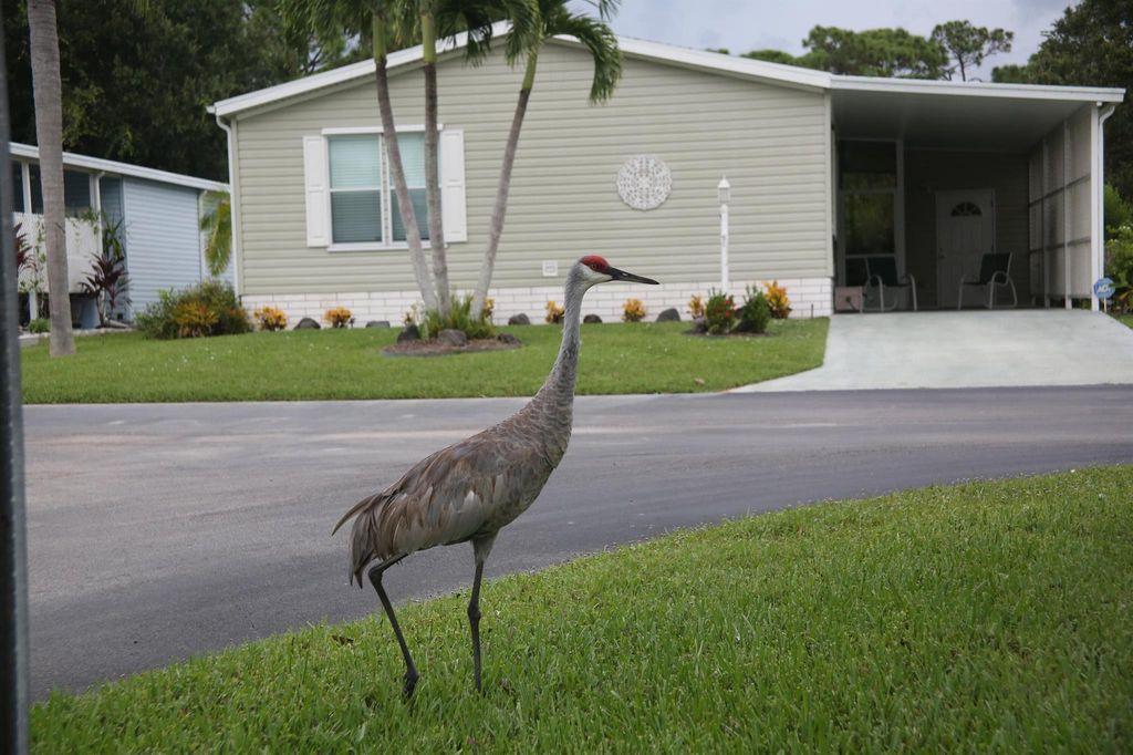 Photo of 320 Tropical Isles Circle #6, Fort Pierce, FL 34982 (MLS # R10921085)