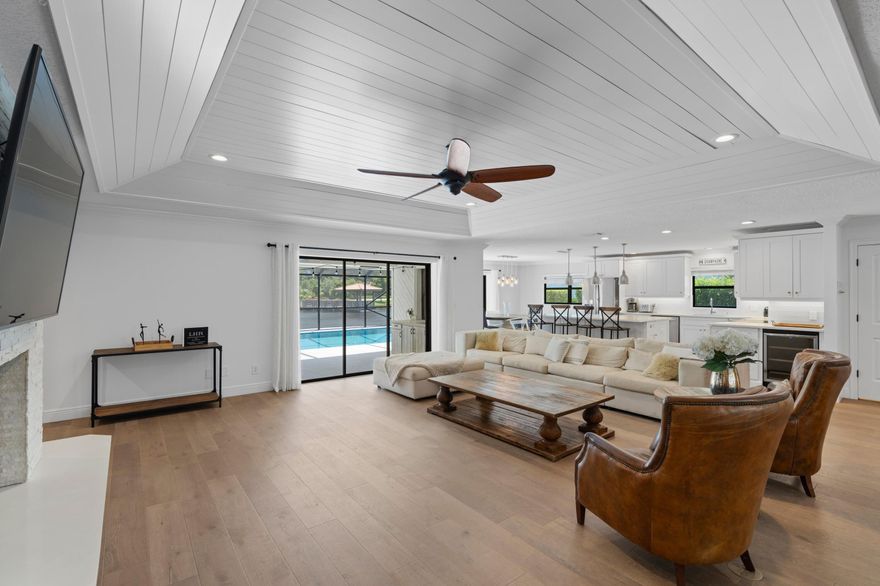 WOW - WHAT A GEM!!! TASTEFULLY RENOVATED, THIS LAKEFRONT POOL HOME BOAST 3 BDR, 2 1/2 BATHS AS WELL AS A SEPARATE, DEDICATED OFFICE/DEN/MEDIA ROOM. IT HAS A SPACIOUS FLOOR PLAN WITH WHITE SHAKER CABINETRY & QUARTZ COUNTERTOPS IN THE OPEN KITCHEN , A LOVELY CENTRAL WOOD BURNING FIREPLACE, AND FULLY RETRACTABLE IMPACT GLASS SLIDERS IN THE LIVING ROOM, DINING ROOM AND MASTER BEDROOM WHICH ALL OPEN TO THE PRIVATE POOL AND PATIO AREA. ENJOY GORGEOUS EVENING SUNSETS FROM EVERY ROOM OVERLOOKING THE LAKE, GAZEBO, AND BEAUTIFUL FOUNTAIN. FRENCHMEN'S LANDING IS FULLY GATED WITH PRIVATE TENNIS AND BASKETBALL COURTS, CHILDREN'S PARK AND LIGHTED WALK/RUN PATHS. UNBEATABLE LOCATION CLOSE TO EVERYTHING - DINING, BEACHES, SHOPPING, GARDENS MALL, I-95.  ANNUAL LEASE CAN BE DISCUSSED AT $12,500/MONTH.