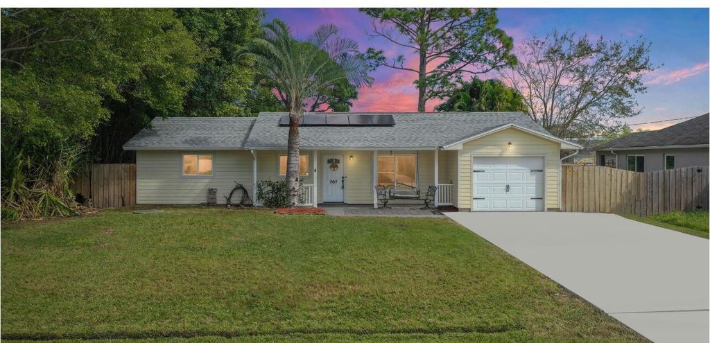 Photo of 707 SW Avens Street, Port Saint Lucie, FL 34983 (MLS # R10954025)