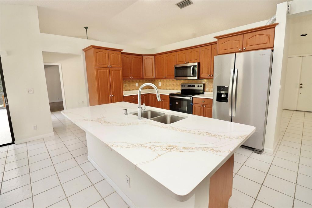 Photo of 5321 NW 58th Terrace, Coral Springs, FL 33067 (MLS # F10501781)
