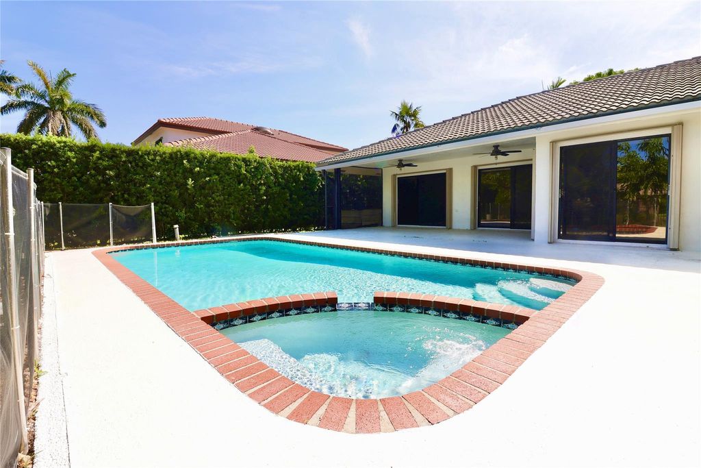 Photo of 5321 NW 58th Terrace, Coral Springs, FL 33067 (MLS # F10501781)