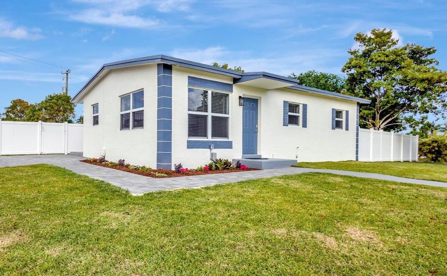 Beautifully updated 3BR/2BA home in Delray Beach on a spacious corner lot with lush lawn and new irrigation! Large backyard features a new privacy fence, large storage shed, and plenty of room for a pool—great for entertaining and your pets! Renovated kitchen with white shaker cabinets, quartz countertops, and stainless appliances. Third bedroom has a private exterior entrance to the patio, ideal for a home office. Upgrades include two updated baths, recessed lighting, new flooring, impact windows, newer roof and A/C, and a new hot water heater. Separate laundry room with washer and dryer. No HOA—perfect as a primary home, vacation getaway, or rental with short-term rentals allowed. Prime location less than 2 miles to the beach and minutes to Atlantic Ave dining, shopping, and nightlife!