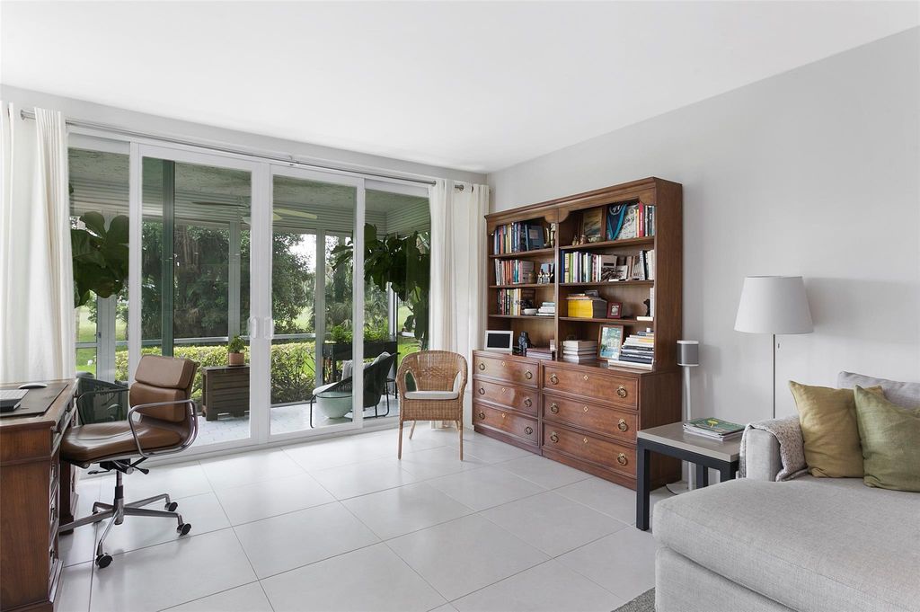 Photo of 804 Cypress Grove Lane #106, Pompano Beach, FL 33069 (MLS # F10453621)