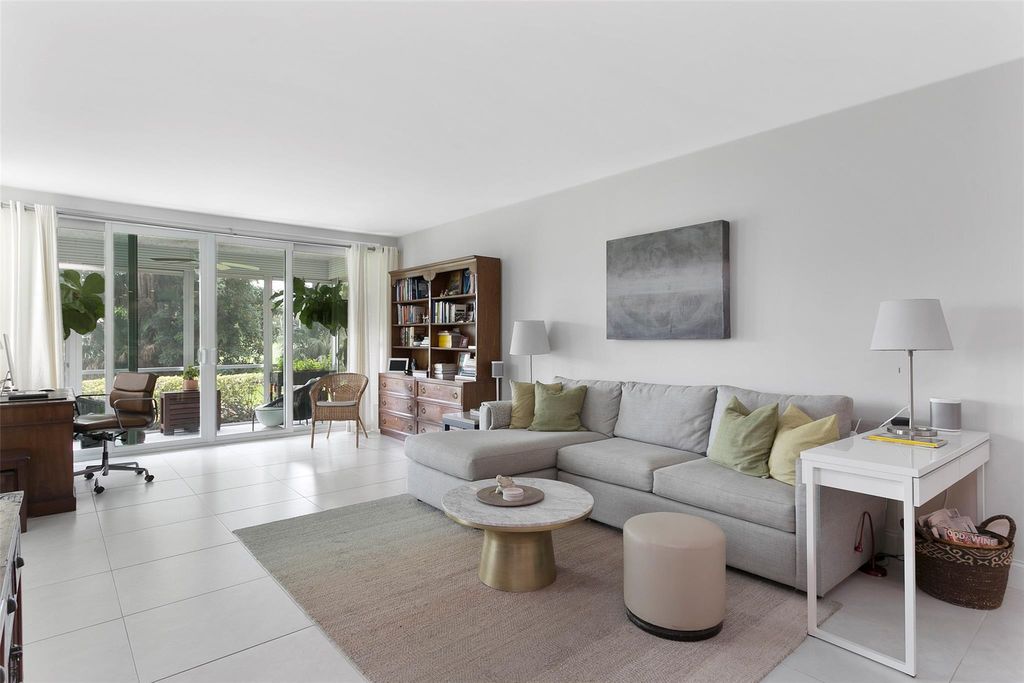 Photo of 804 Cypress Grove Lane #106, Pompano Beach, FL 33069 (MLS # F10453621)