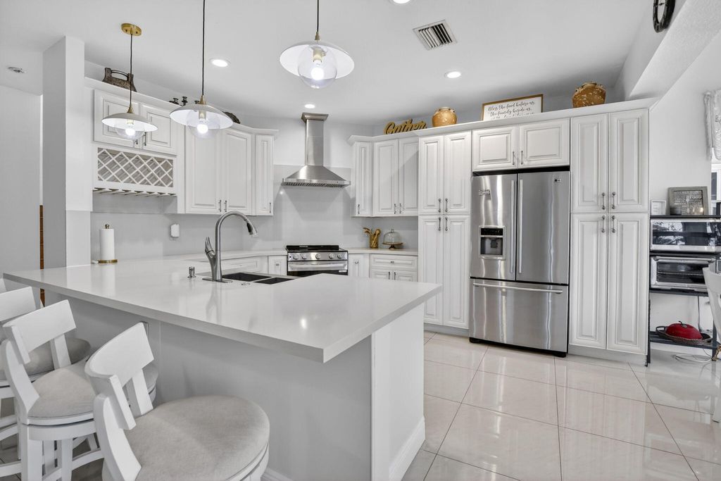 Photo of 711 Heritage Way, Weston, FL 33326 (MLS # B26024330)