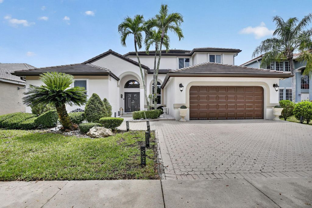 Photo of 711 Heritage Way, Weston, FL 33326 (MLS # B26024330)