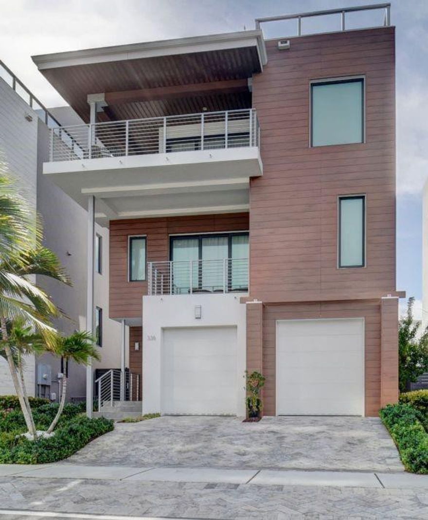 MODERN BEACH HOME JUST STEPS AWAY FROM SEMI-PRIATE BEACH!  3 LEVELS OF LIVING SPACE INCLUDE 3 BEDROOMS, 3.5 BATHS PLUS DEN WHICH CAN BE EASILY CONVERTED INTO 4TH BEDROOM.  PRIVATE ELEVATOR ACCESS TO ALL FLOORS INCLUDING ROOFTOP.  ENJOY THE ROOFTOP'S OUTDOOR KITCHEN AND ITS STUNNING VIEWS OF BOTH OCEAN AND INTRACOASTAL. INTERIOR BOASTS ITALIAN KITCHEN WITH GOURMET APPLIANCES, WOOD STYLE PORCELAIN FLOORING AND UPGRADED FINISHINGS. FANTASTIC VIEWS FROM THE LIVING ROOM AND WRAP AROUND BALCONY.   LARGE MASTER SUITE HAS TWO WALK IN CUSTOM CLOSETS AND PRIVATE BALCONY.  OWNERS CAN FEEL SECURE WITH THE HIGH IMPACT WINDOWS AND DOORS.  HOUSE HAS HOOK UP FOR GENERATOR.  TWO CAR GARAGE AND TWO DRIVEWAY SPACES.  PERFECT FOR A PRIMARY OR VACATION HOME.  NO HOA.  FURNITURE IS NEGOTABLE.