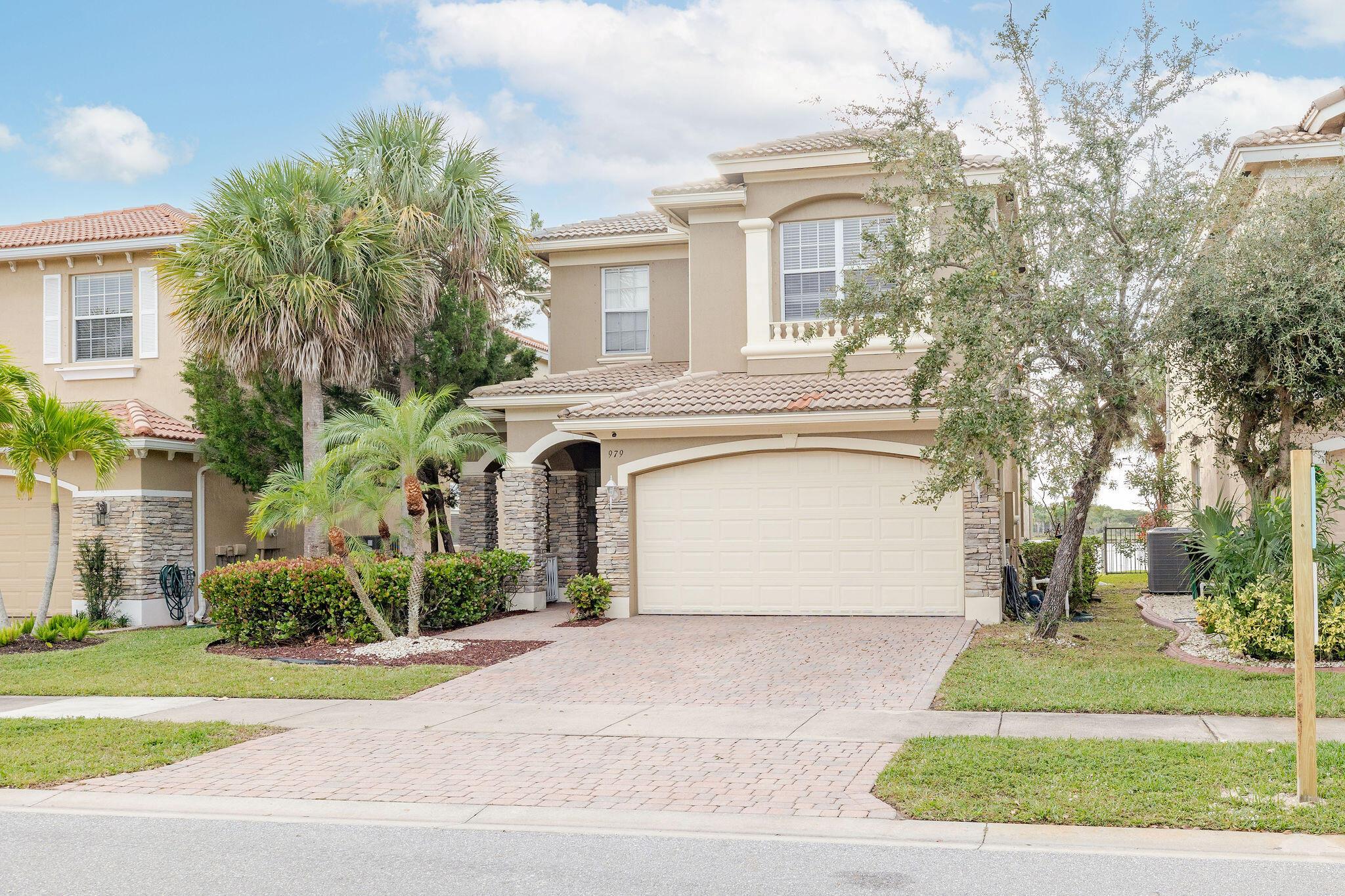 Welcome to your very own Florida retreat! This spacious 4-bedroom, 2.5-bath home greets you with tranquil lake views from the formal living room, dining area, and cozy family room--each space showcasing the beauty of the water. Downstairs, enjoy elegant tile floors and sleek stainless steel appliances, while upstairs you'll find warm wood laminate flooring. Built with sturdy concrete block on both levels, this home is designed for lasting comfort. You'll also love the fantastic community amenities, including a grand clubhouse with a sparkling pool, fitness center, community room, game area, basketball court, two tennis courts, and a delightful picnic spot--perfect for soaking up the Florida sunshine. Come discover your peaceful lakeside escape!