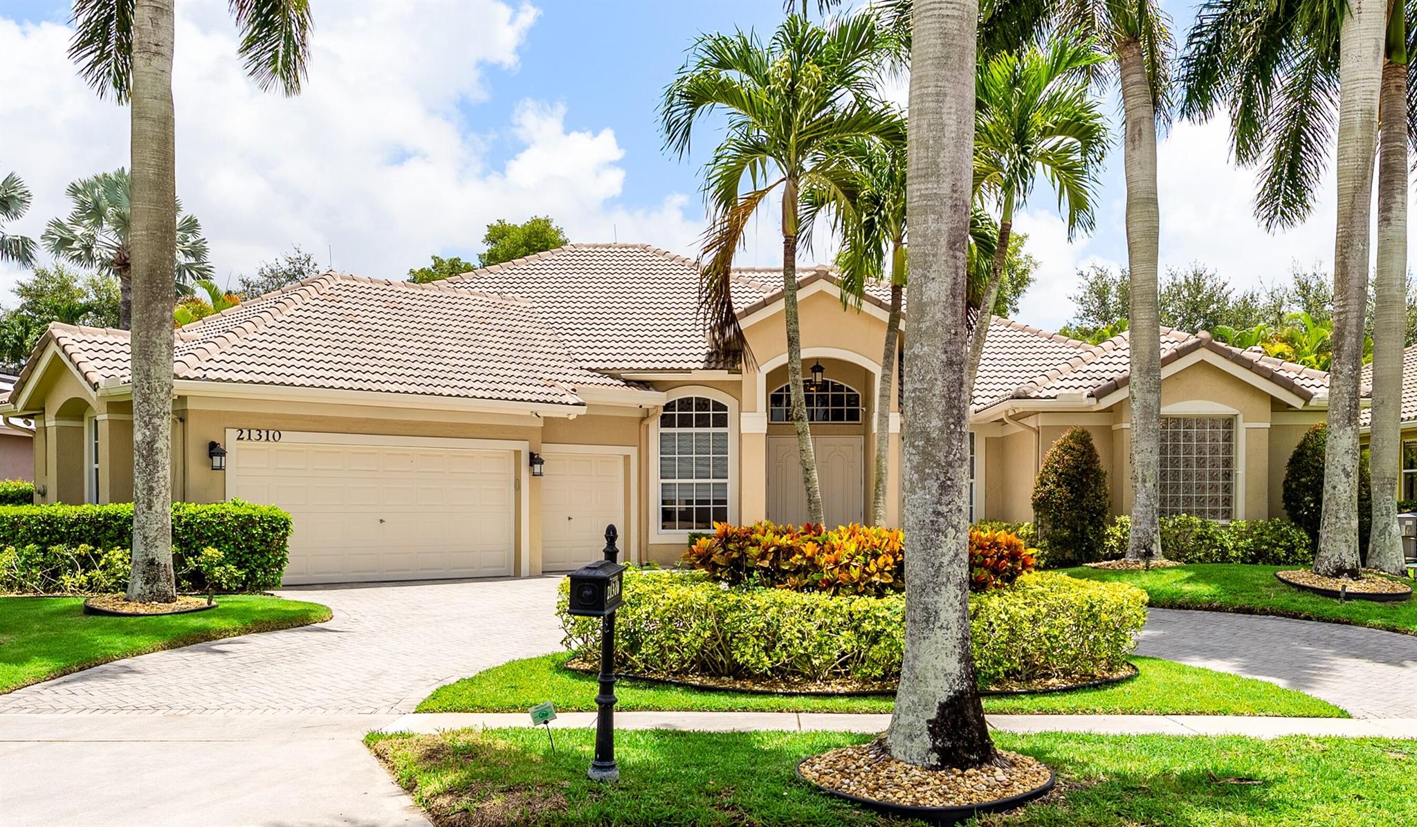 Stunning 4BR Pool Home PLUS a Media Room, Home Office & Many Upgrades! Welcome to this exceptional, move-in-ready residence in the Estates section of highly desired Boca Falls! It offers 4 spacious bedrooms, a Home Office (with a wall-mounted monitor), 3.5 baths, and a Huge Media Room--perfect for entertaining or relaxing in style. Step outside to your private backyard oasis, complete with an enclosed heated pool/spa--ideal for year-round enjoyment. The entire interior was just painted! Home features impact windows, travertine flooring throughout, crown molding, and newer bathrooms with frameless glass shower doors. Enjoy elevated living with high-end touches like crystal chandeliers, designer lighting, built-in wine fridge, and motorized roller shades.