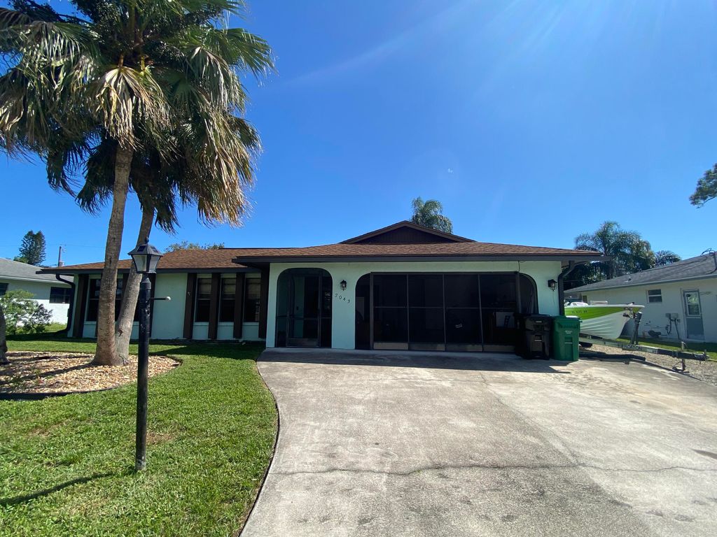 Photo of 2043 SE Benedictine Street, Port St Lucie, FL 34983 (MLS # R10838695)