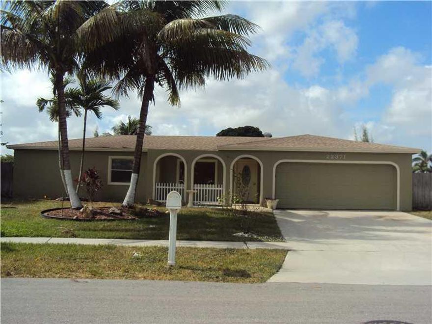 Boca Raton 3 bedroom 2 bath, 2 car garage, pool, screened in porch, large open patio area, large private yard, storage shed, on a canal. Updated kitchen with stainless steel appliances. Washer and dryer in house. Storage shed. Just painted inside. Rent in cludes yard, pool and alarm service which can be negotiated by tenant if they can do. No association approval needed, ready for a fast move in.