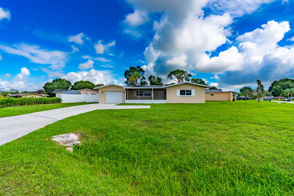 Photo of 613 Beach Avenue, Port Saint Lucie, FL 34952 (MLS # B26049265)