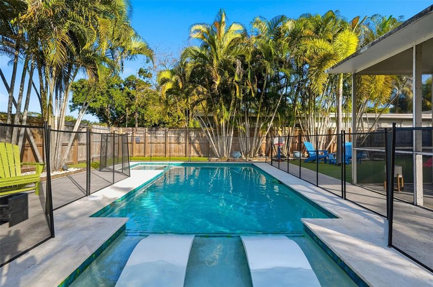 Welcome to 2619 Cleveland St, an incredibly well-maintained and thoughtfully upgraded 2-bedroom, 1-bathroom home located in the heart of East Hollywood. The home features impact windows, a Generac whole-home generator, and recently installed flooring. The bathroom has been tastefully renovated and the kitchen has been updated with granite countertops and newer appliances. Plantation shutters throughout add charm and elegance to every room.Step outside to your private backyard oasis, complete with a brand-new heated pool and spa, turf landscaping, and travertine pavers. Enjoy peaceful evenings under the screened-in porch overlooking the pool, creating an ideal indoor-outdoor living experience. Walking distance to the Yellow Green Farmers Market and just 10 minutes to Hollywood Beach.