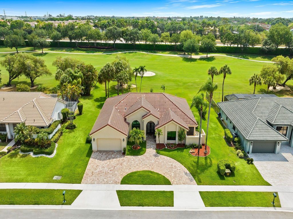 Photo of 11386 Boca Woods Ln, Boca Raton, FL 33428 (MLS # F10441748)