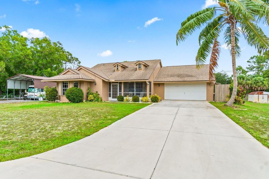 Photo of 13081 61st Lane N, West Palm Beach, FL 33412 (MLS # R10997949)