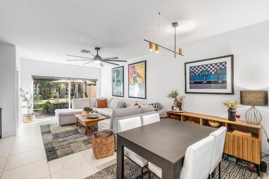 Welcome to 6968 Crooked Fence Drive,  located in the desirable Smithbrooke gated commmunity. This beautifully maintained home features updated bathrooms, impact glass windows, and an extended living space that offers added flexibility for entertaining or everyday living. The interior showcases vaulted ceilings,no carpet throughout, providing a clean, modern feel with easy maintenance. Natural light fills the home, highlighting the open layout and thoughtful upgrades. Step outside to enjoy a peaceful outdoor space, perfect for relaxing or hosting gatherings in a serene setting. Smithbrooke is a well-established Lake Worth neighborhood known for its tree-lined streets and convenient access to schools, shopping, dining, and major roadways.Smithbrooke offers residents a variety of activities. On-Site Community Amenities
Smithbrooke offers residents a variety of shared recreational and lifestyle features:
Gated Community
Controlled access for residents and guests. 
Clubhouse
Community Swimming Pool
Hot Tub / Spa
Exercise / Fitness Room
Community Room with Games
Sidewalks & Street Lighting