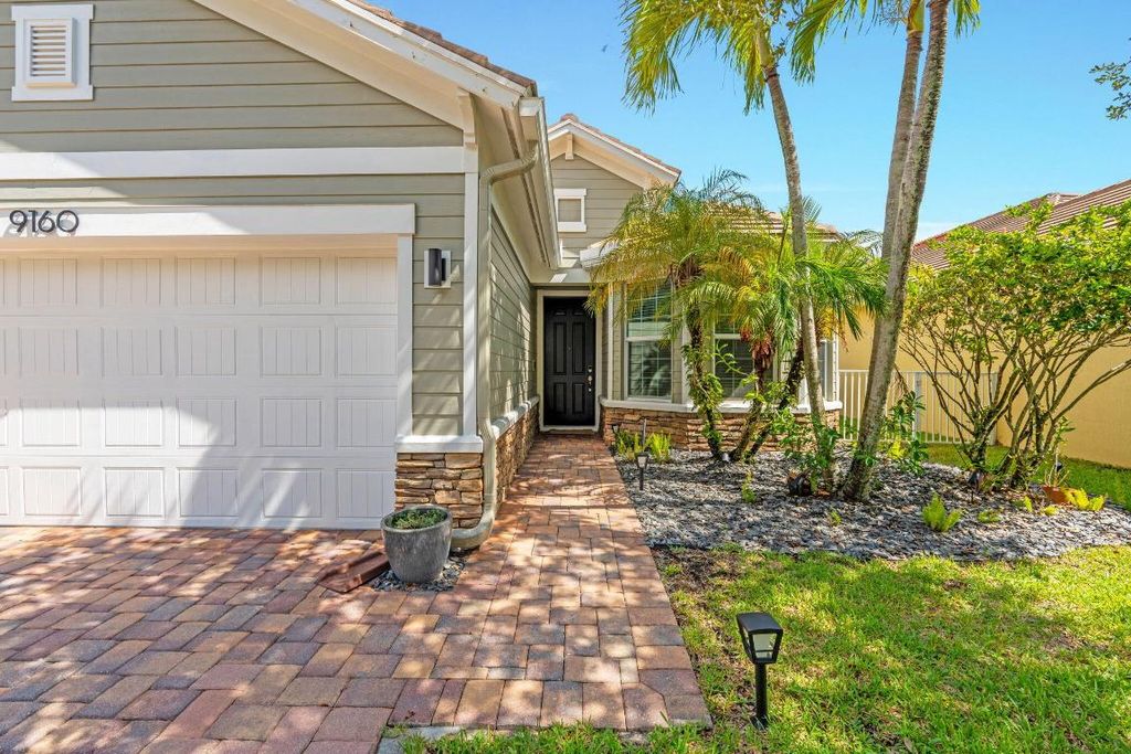 Photo of 9160 Wrangler Drive, Lake Worth, FL 33467 (MLS # R11122867)