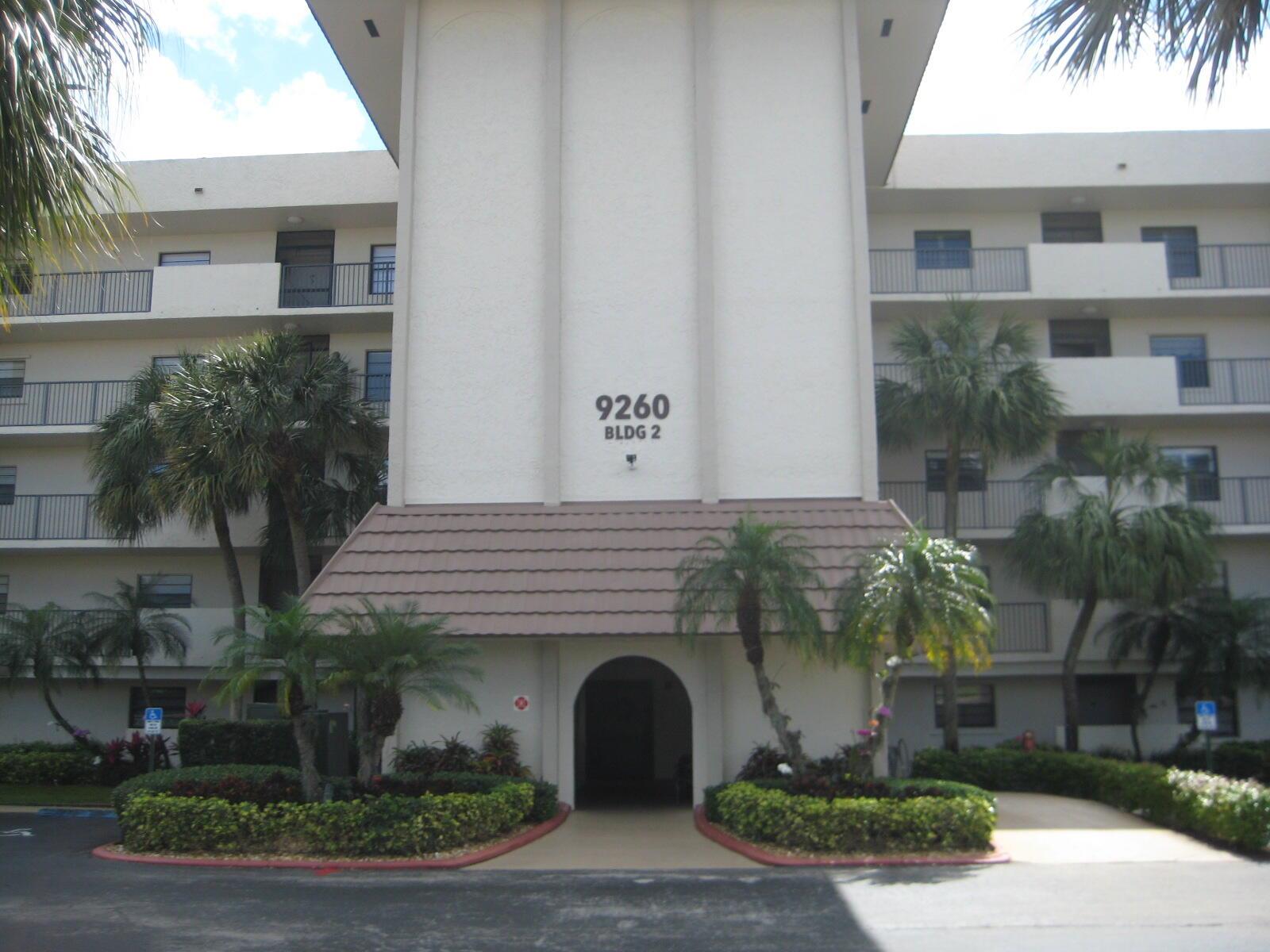 Patios of Boca Barwood, a 55+ community. This spacious unit features 2 bedrooms and 2 baths, offering over 1,500 square feet of living area, along with a generously sized screened patio of over 250 square feet. Bright, open, and well-cared for, it's ready for your personal touch to make it your dream home. Recent updates include a 2-year-old A/C and a 4-year-old water heater, which has been recently serviced. The kitchen includes a cozy eat-in breakfast nook and plenty of cabinet space. The formal dining room accommodates a large table and breakfront, while the living room provides tranquil views of the golf course and garden. Both master bedrooms are ensuite, with custom-built closets and modern ceramic tile throughout.Buver to verify all HOA info