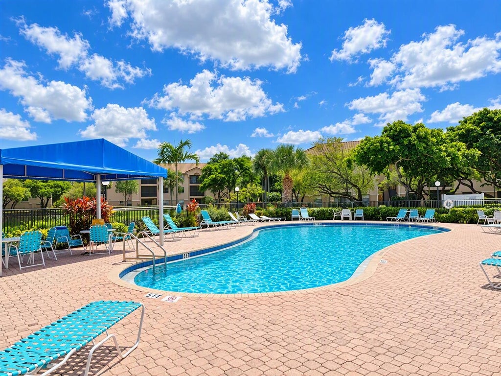 Photo of 4111 Coral Tree Circle #227, Coconut Creek, FL 33073 (MLS # B26081578)