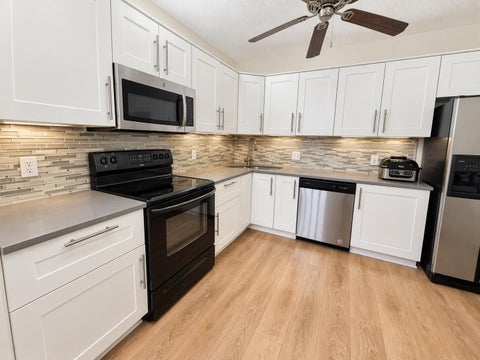 Tiny photo for 4111 Coral Tree Circle #227, Coconut Creek, FL 33073 (MLS # B26081578)