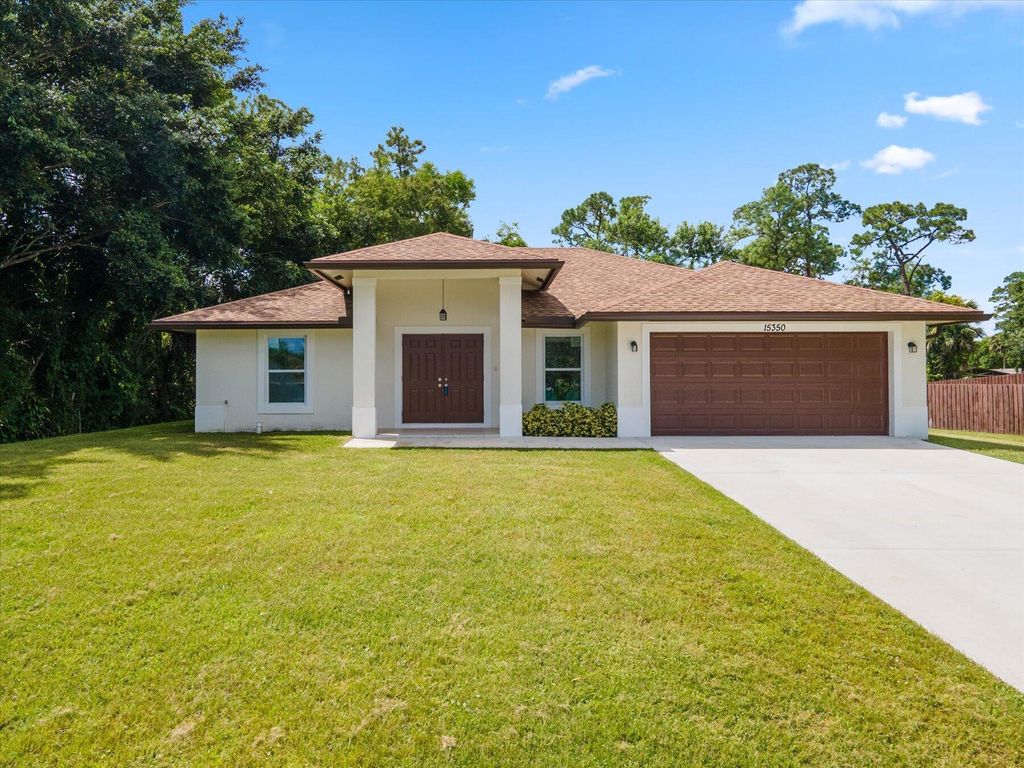 Photo of 15350 Los Angeles Drive, Loxahatchee Groves, FL 33470 (MLS # R10923989)