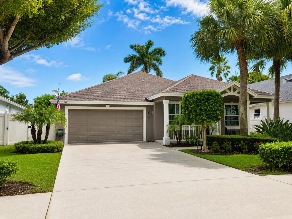 Photo of 241 Clocktower Drive, Jupiter, FL 33458 (MLS # B26077045)